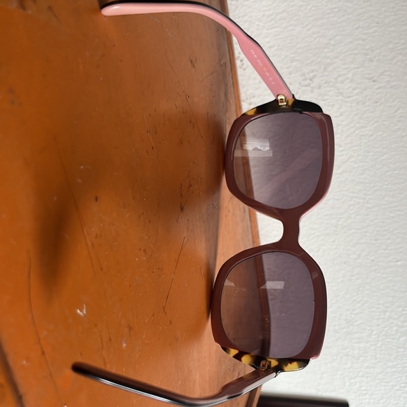 Prada sunglasses. Gently worn. No scratches.comes with case. - Picture 2 of 4